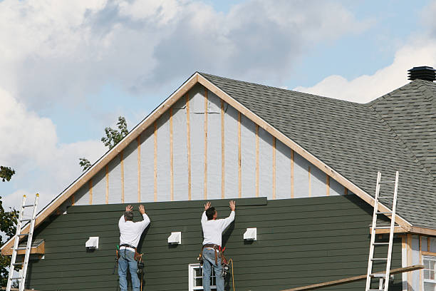 Professional Siding Installation technician working in Freeport, PA